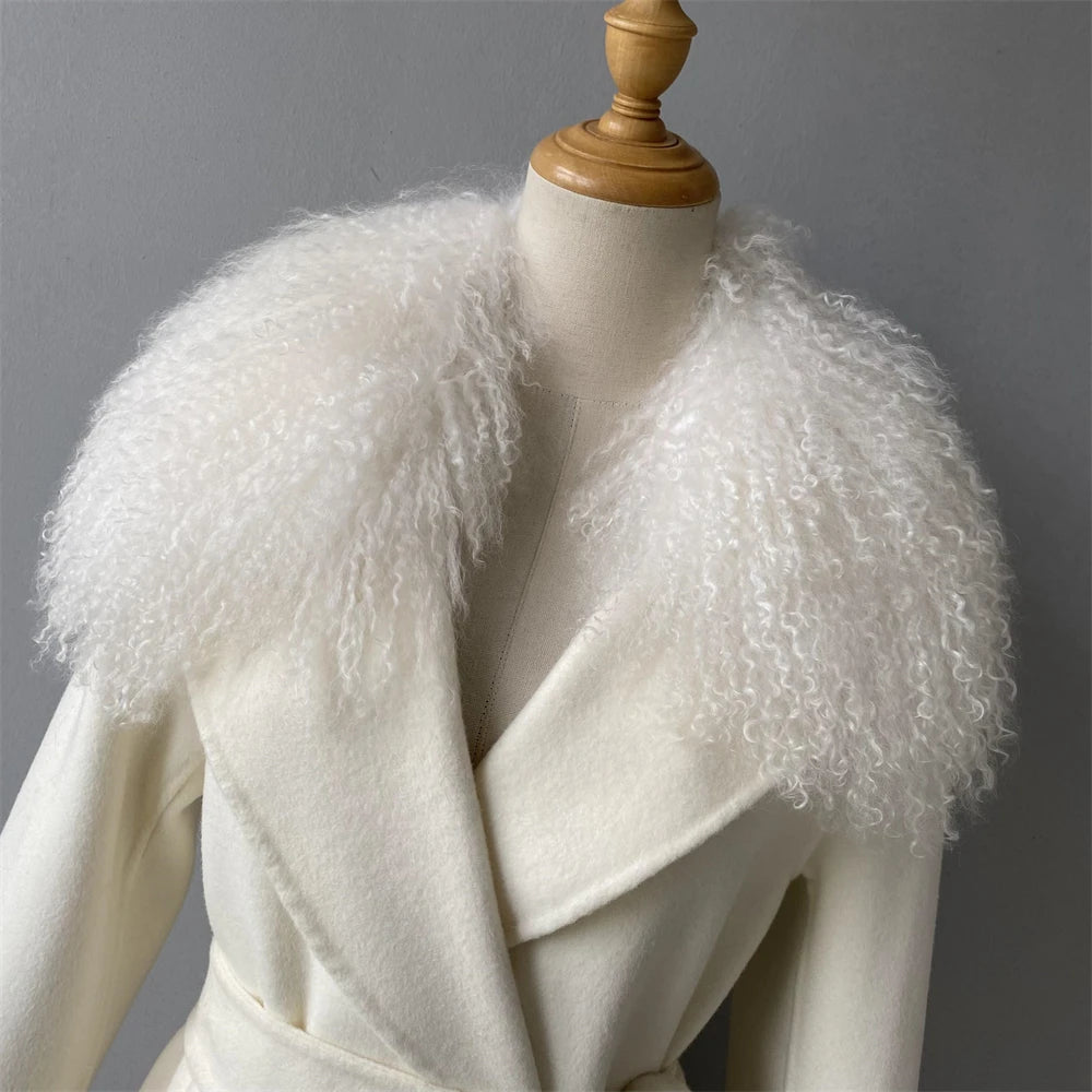 White coat with fluffy collar on a mannequin against a gray background
