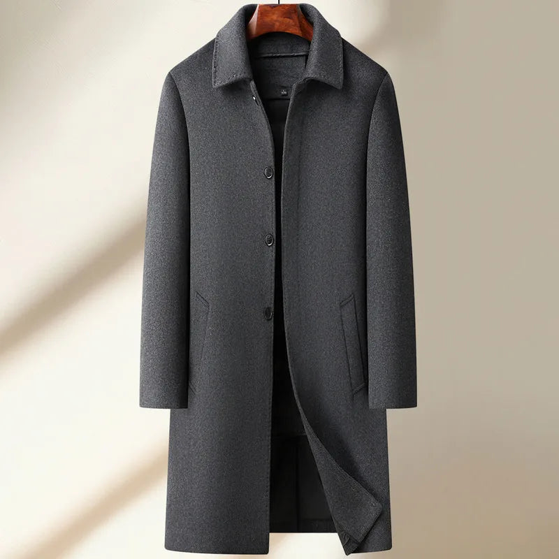 Gray overcoat on a beige background