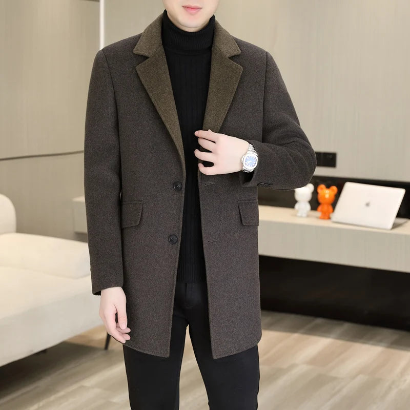 Man wearing a brown coat in an indoor setting