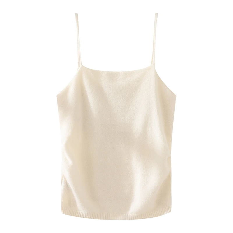 Beige spaghetti strap top on a white background
