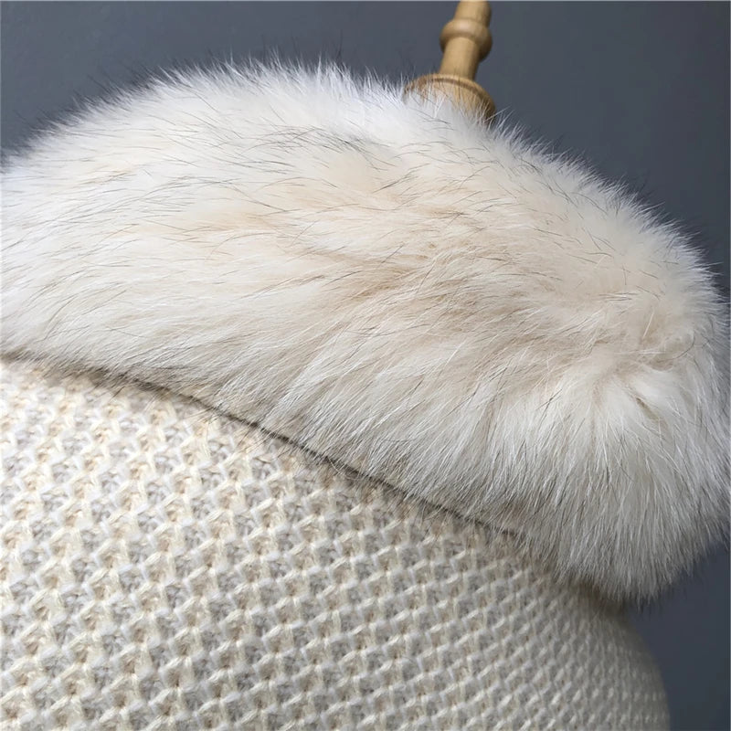 Close-up of a textured fabric with fur trim on a dark background