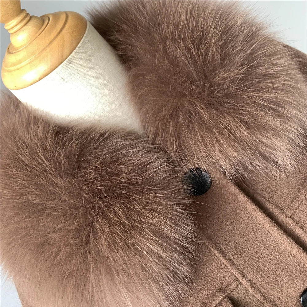 Close-up of a brown coat with fur collar on a mannequin