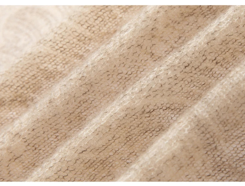 Close-up of beige textured fabric with diagonal lines