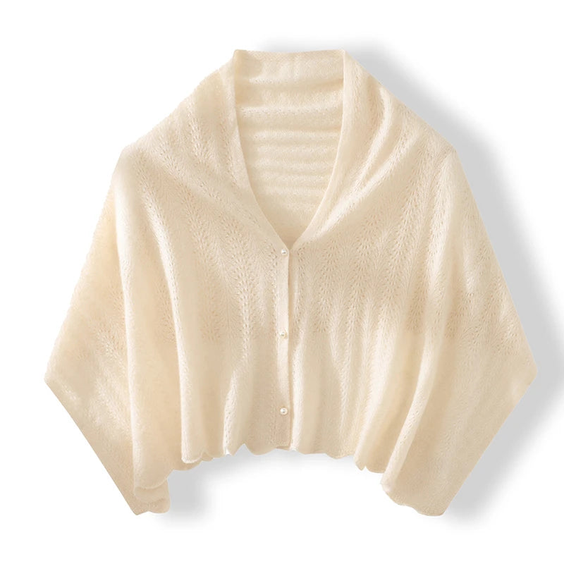 Beige knitted cardigan on a white background