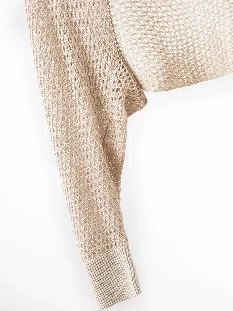 Beige knitted sweater on a white background