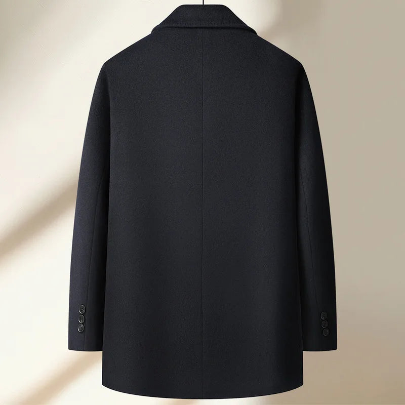 Black coat on a beige background