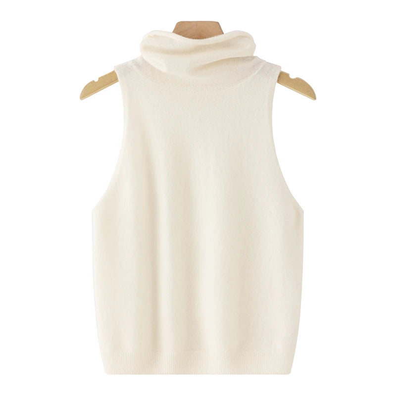White sleeveless sweater on a mannequin against a white background