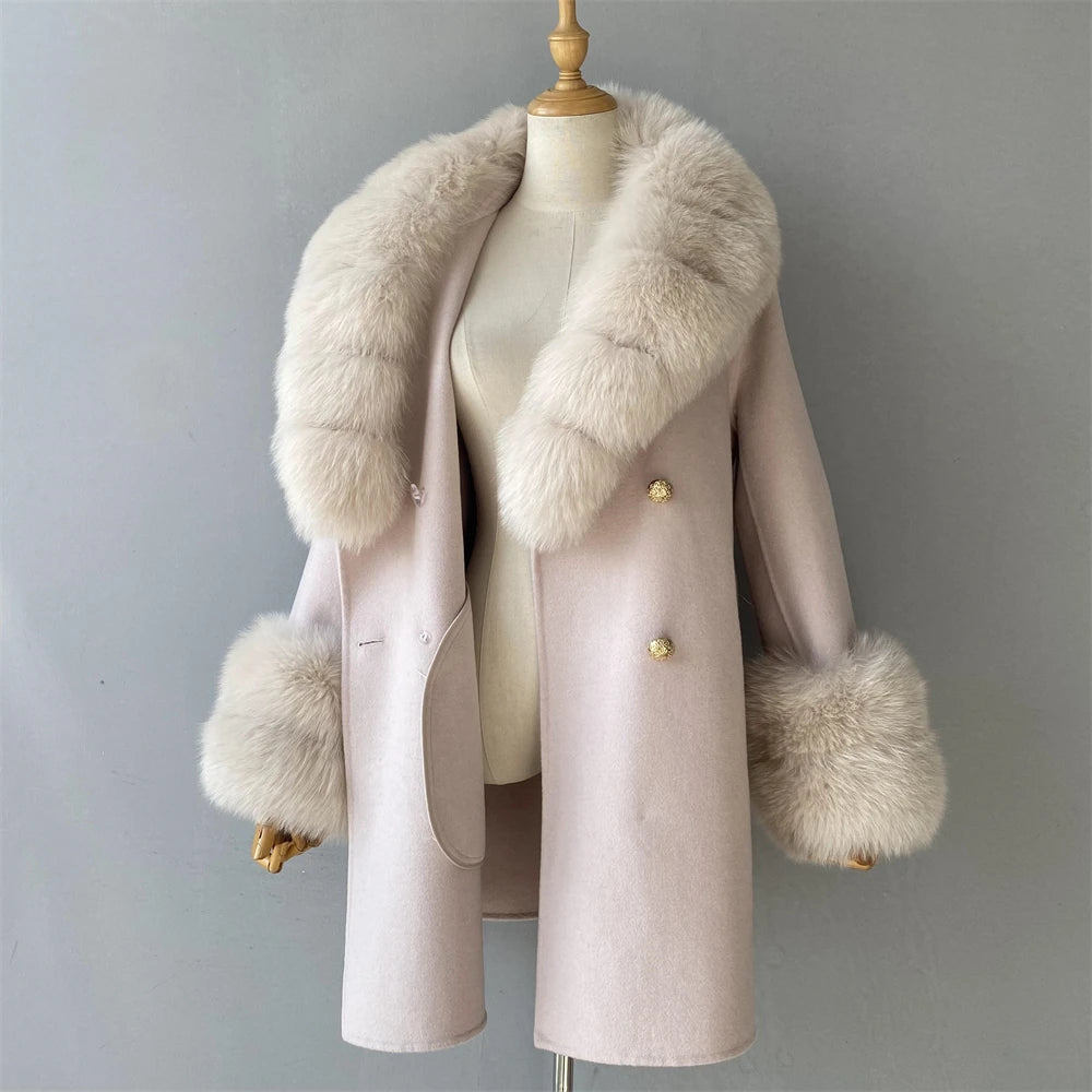 Pink coat with fur trim on a mannequin against a gray background