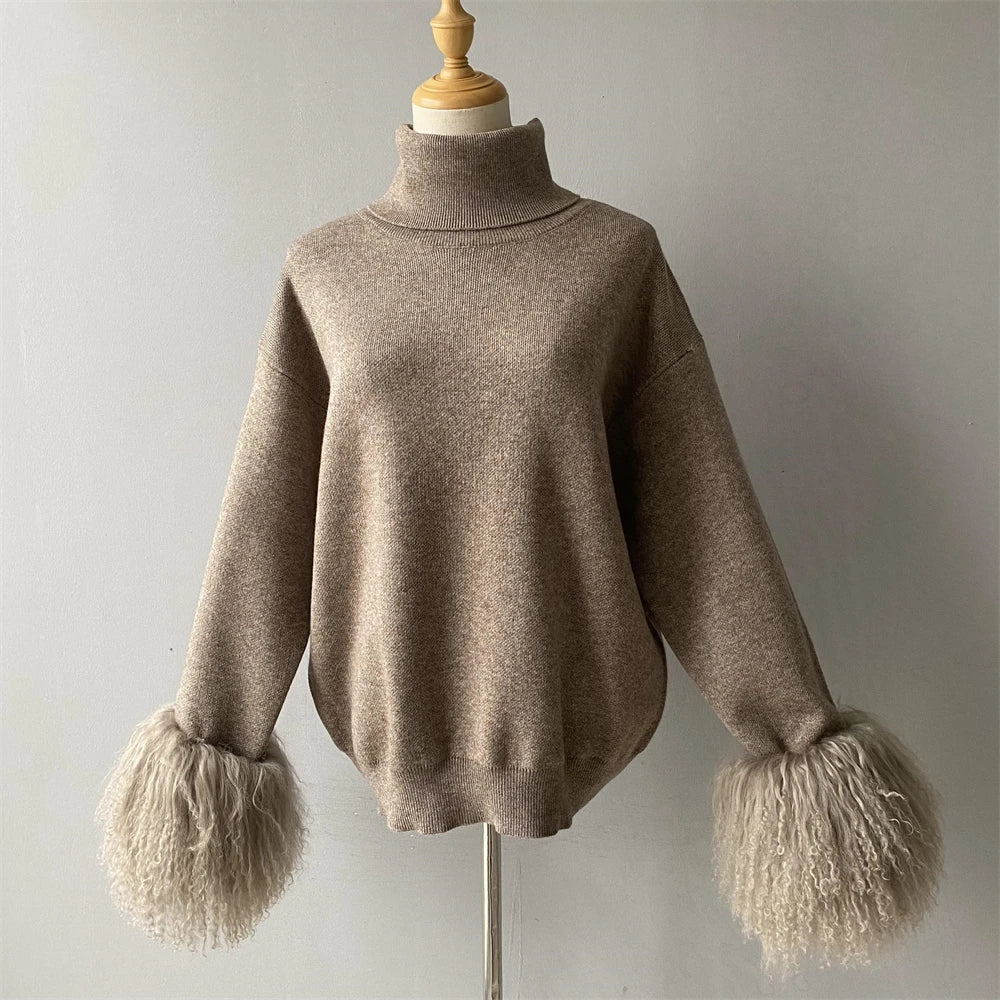 Brown sweater with fluffy cuffs on a mannequin against a gray background