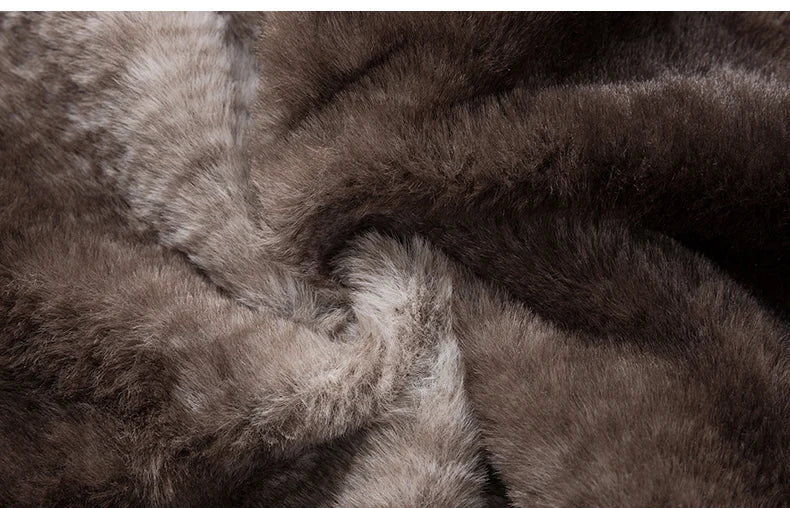 Close-up of brown fur fabric with a label in the bottom left corner.