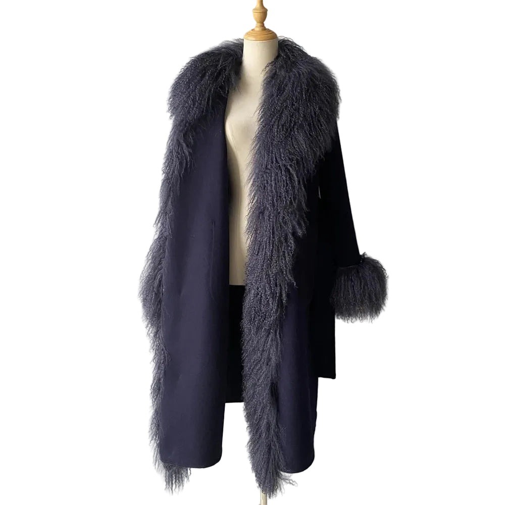 Navy coat with fluffy fur trim on a mannequin against a plain background