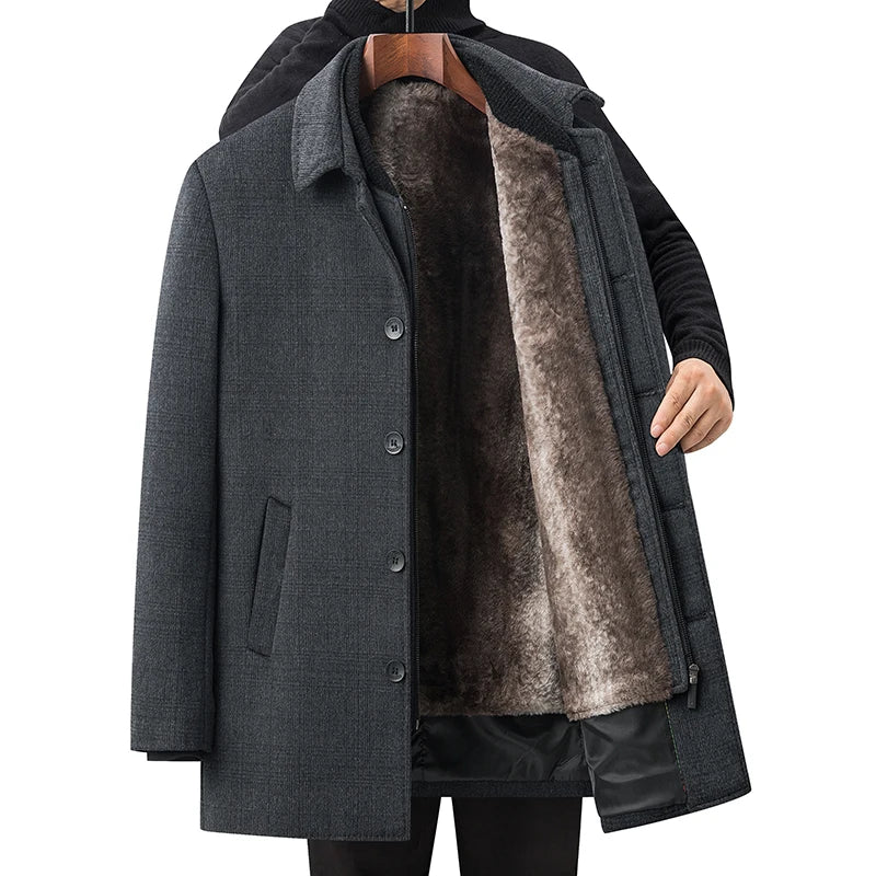 Gray coat with fur lining on a white background