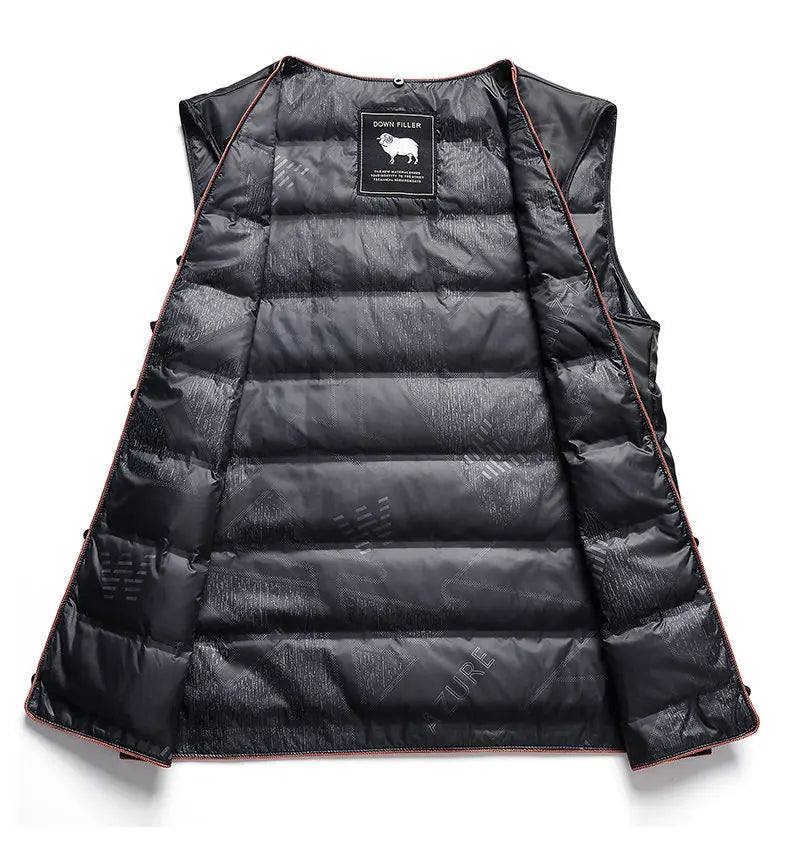 Black puffer vest with a brand label on a white background