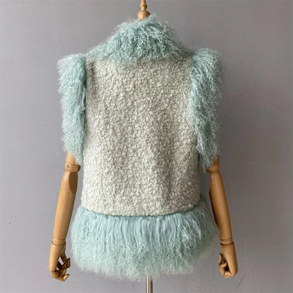 Mannequin wearing a textured sweater with light blue sleeves and hem against a gray background