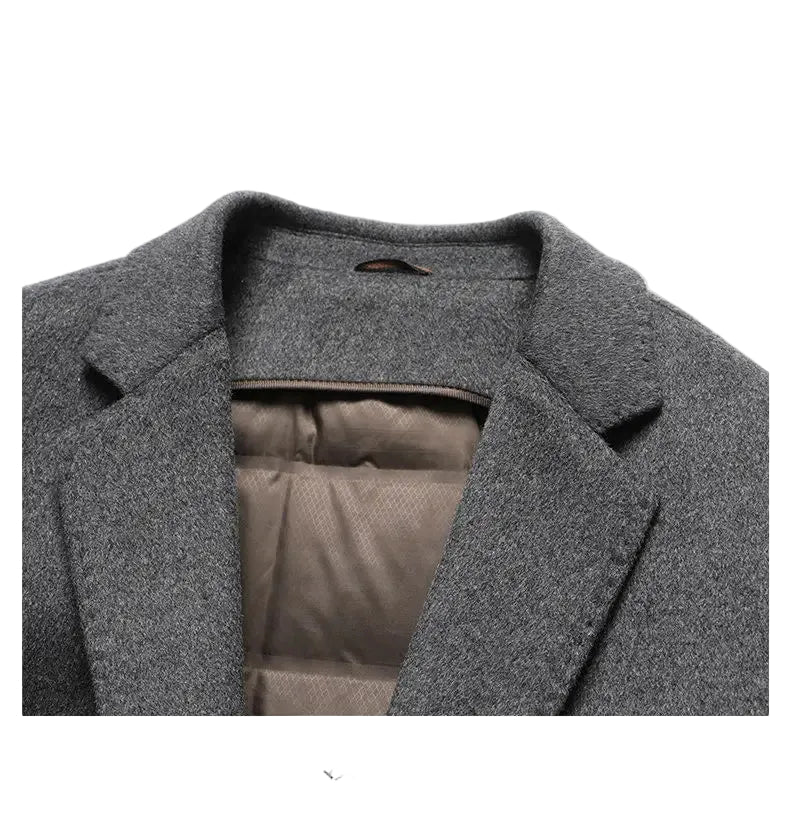Gray coat with a focus on the collar and inner lining, displayed against a white background.