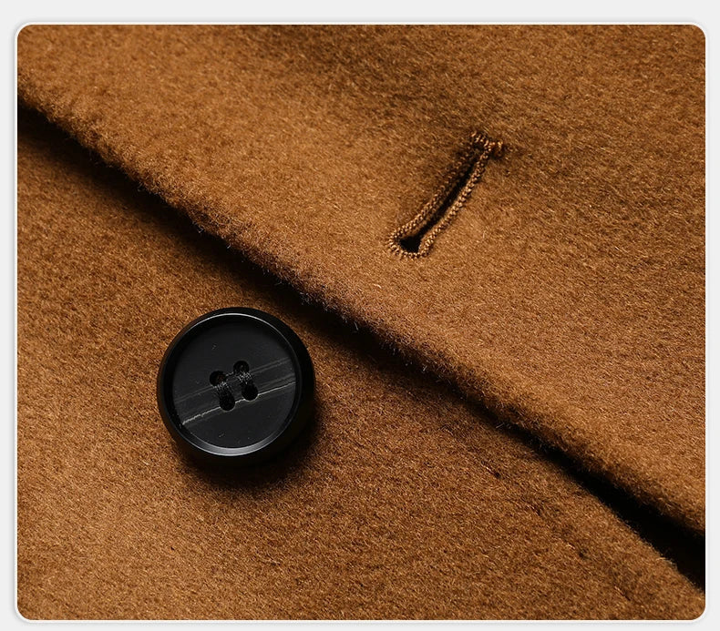 Close-up of brown fabric with a button on a white background