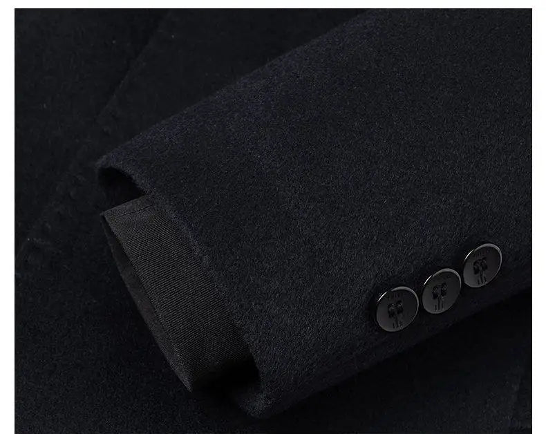 Close-up of a black suit jacket with button details on a dark background