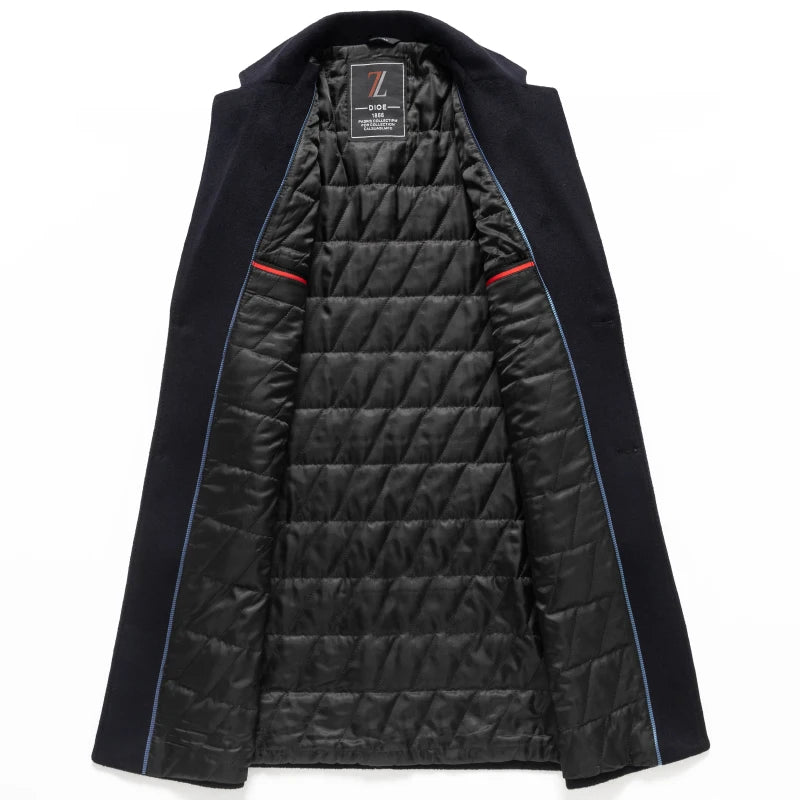 Navy blue coat with quilted black lining on a white background