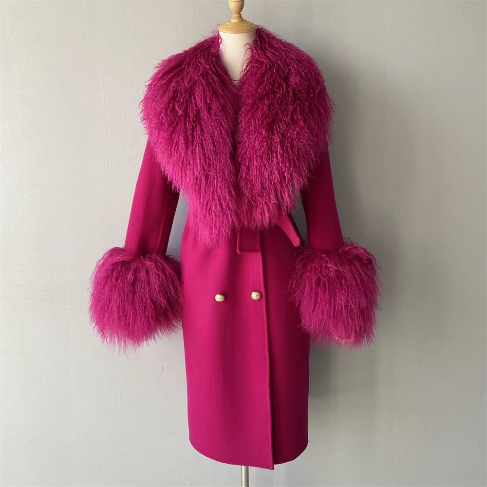 Pink coat with fur cuffs and collar on a mannequin against a plain background
