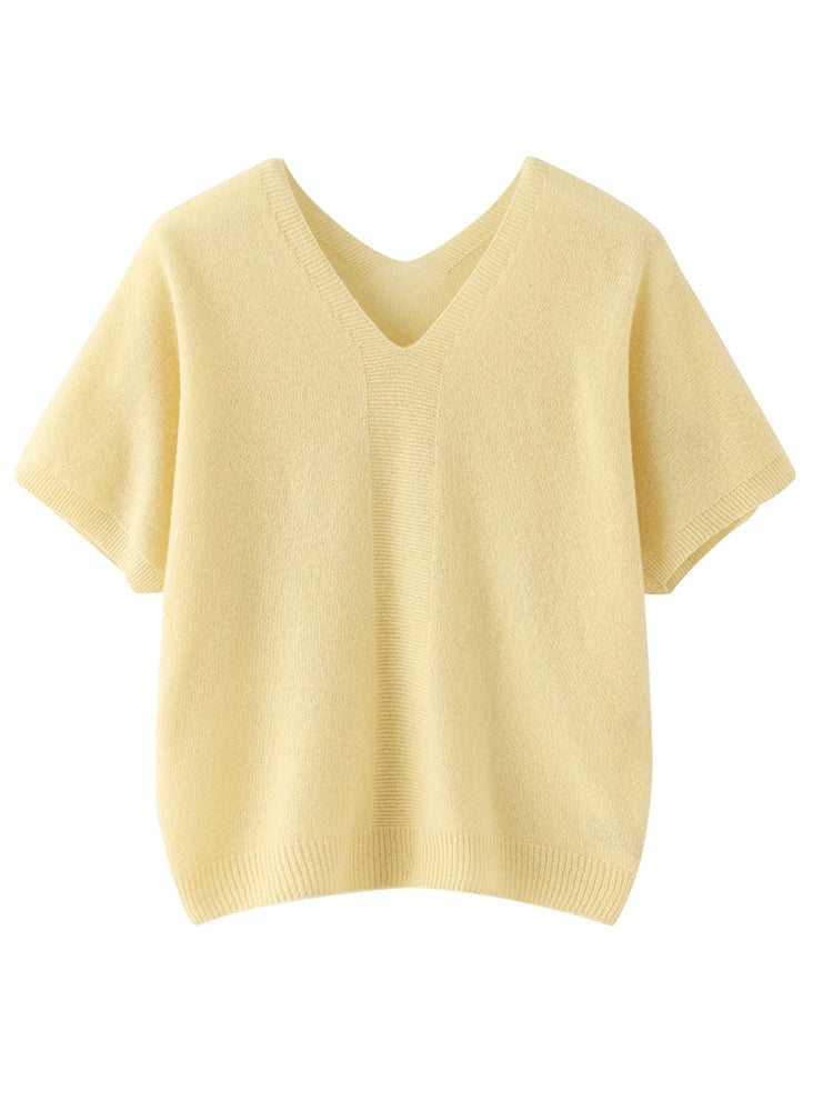Yellow sweater with short sleeves on a white background
