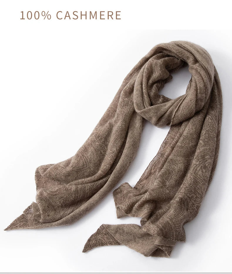 Brown cashmere scarf on a white background with '100% Cashmere' text.