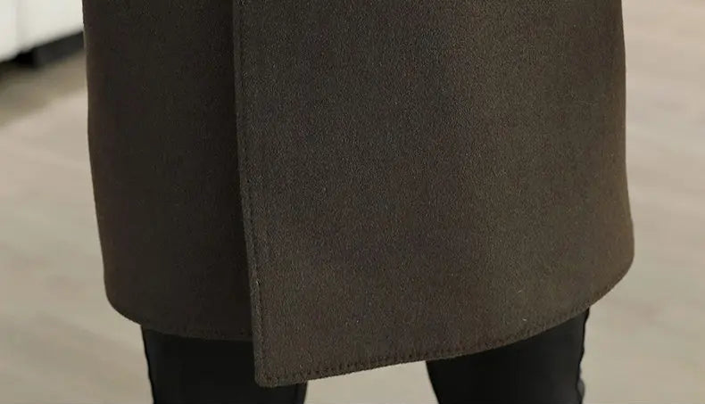 Close-up of a brown coat with a blurred background