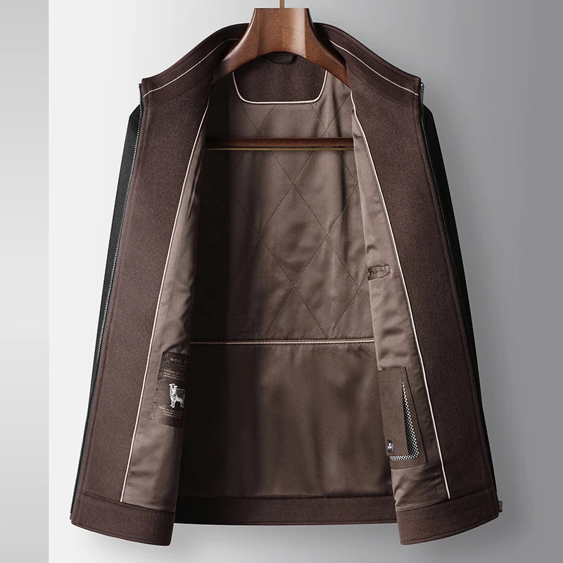 Brown jacket on a hanger against a gray background