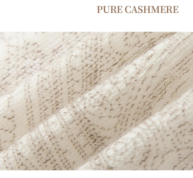 Close-up of pure cashmere fabric with 'PURE CASHMERE' text above.