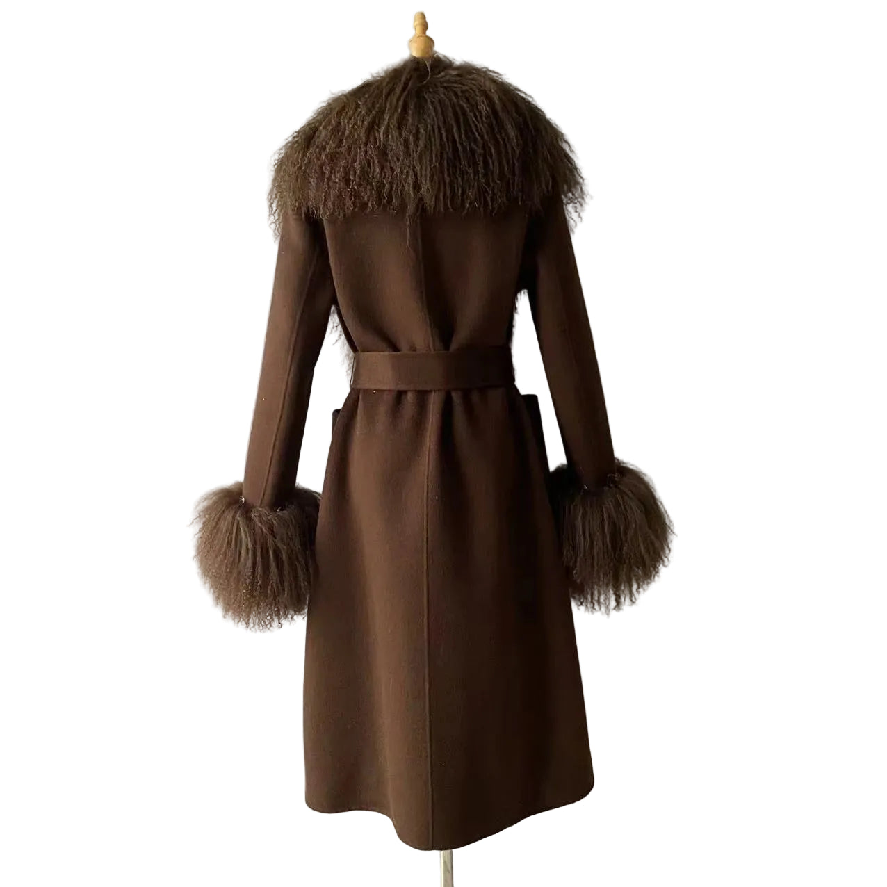 Brown coat with fur trim on a mannequin against a plain background