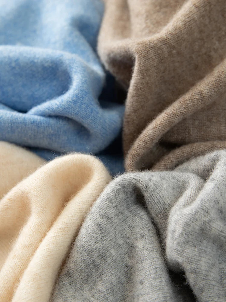 Close-up of fabric swatches in blue, brown, beige, and gray.