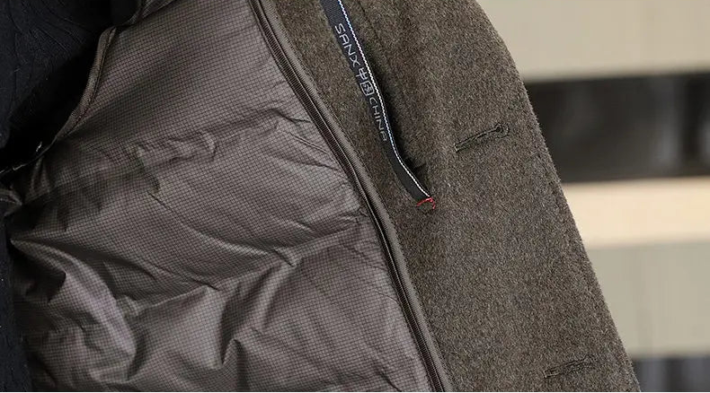 Close-up of a gray jacket with visible stitching detail