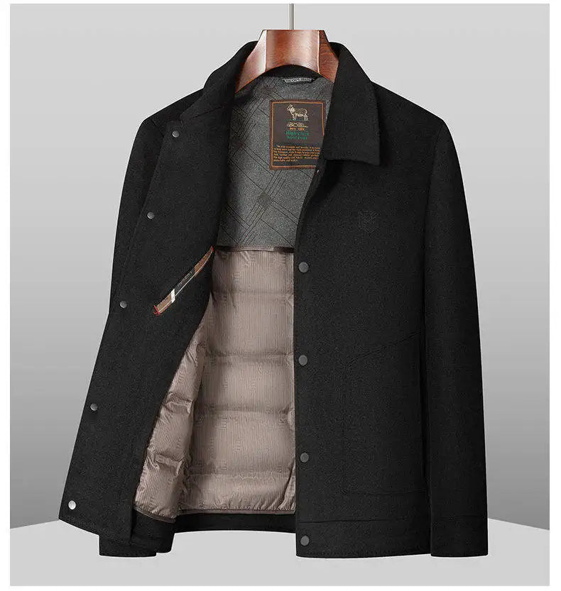 Black coat with a gray interior lining on a gray background