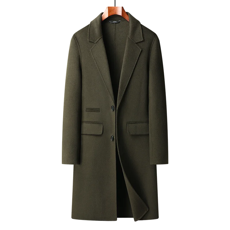 Green coat on a hanger against a white background
