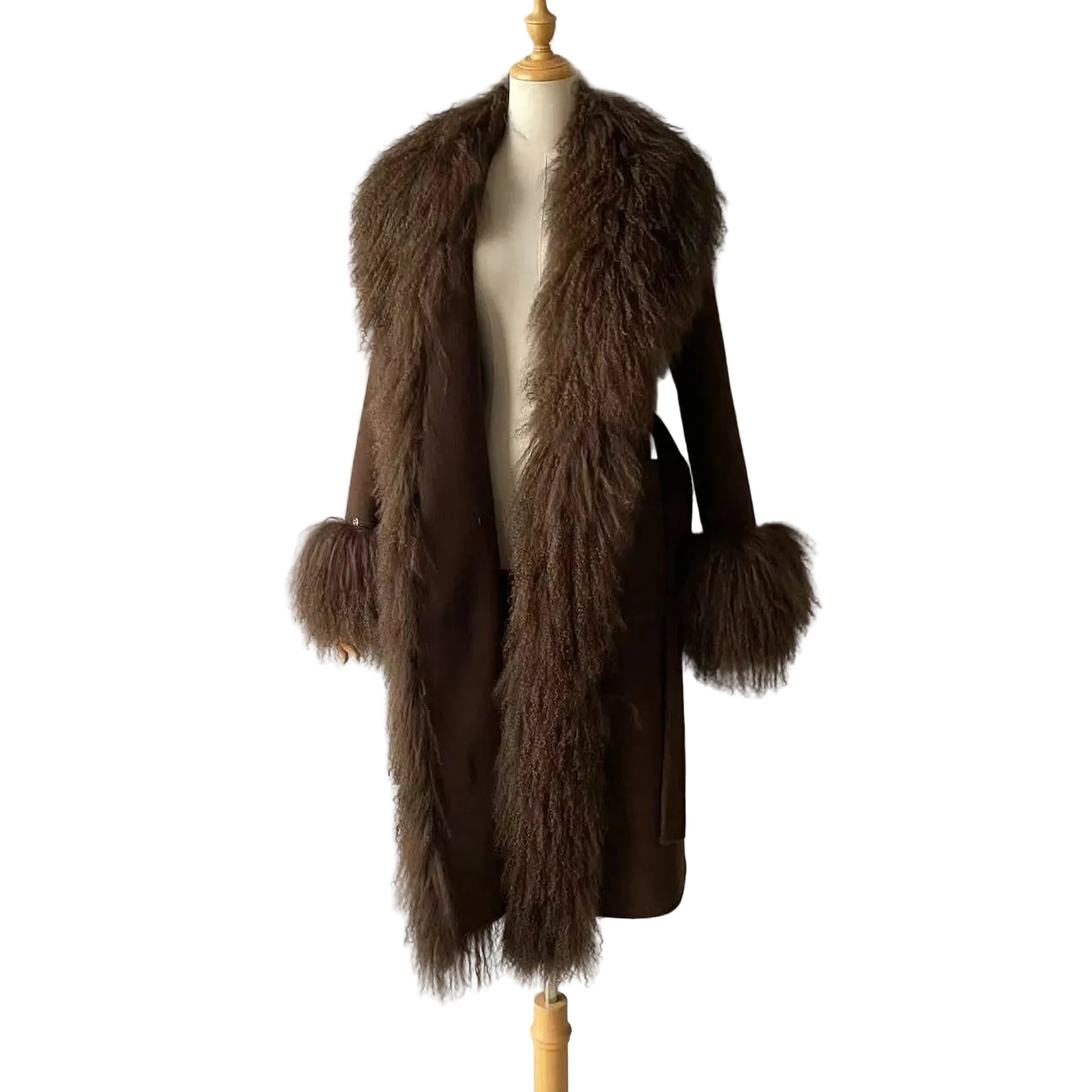 Brown fur coat on a mannequin against a plain background