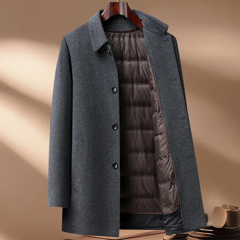 Gray coat with a brown puffer lining on a beige background