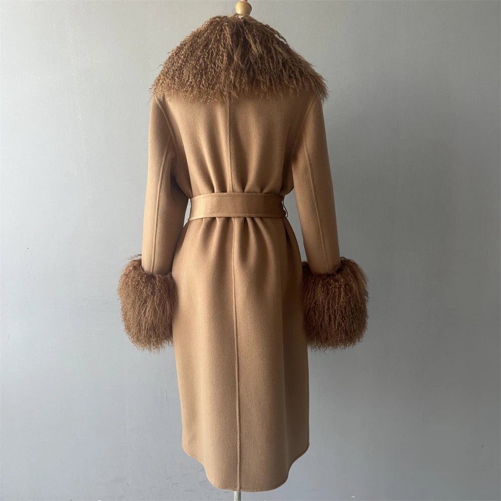Brown coat with fur trim on a mannequin against a gray background