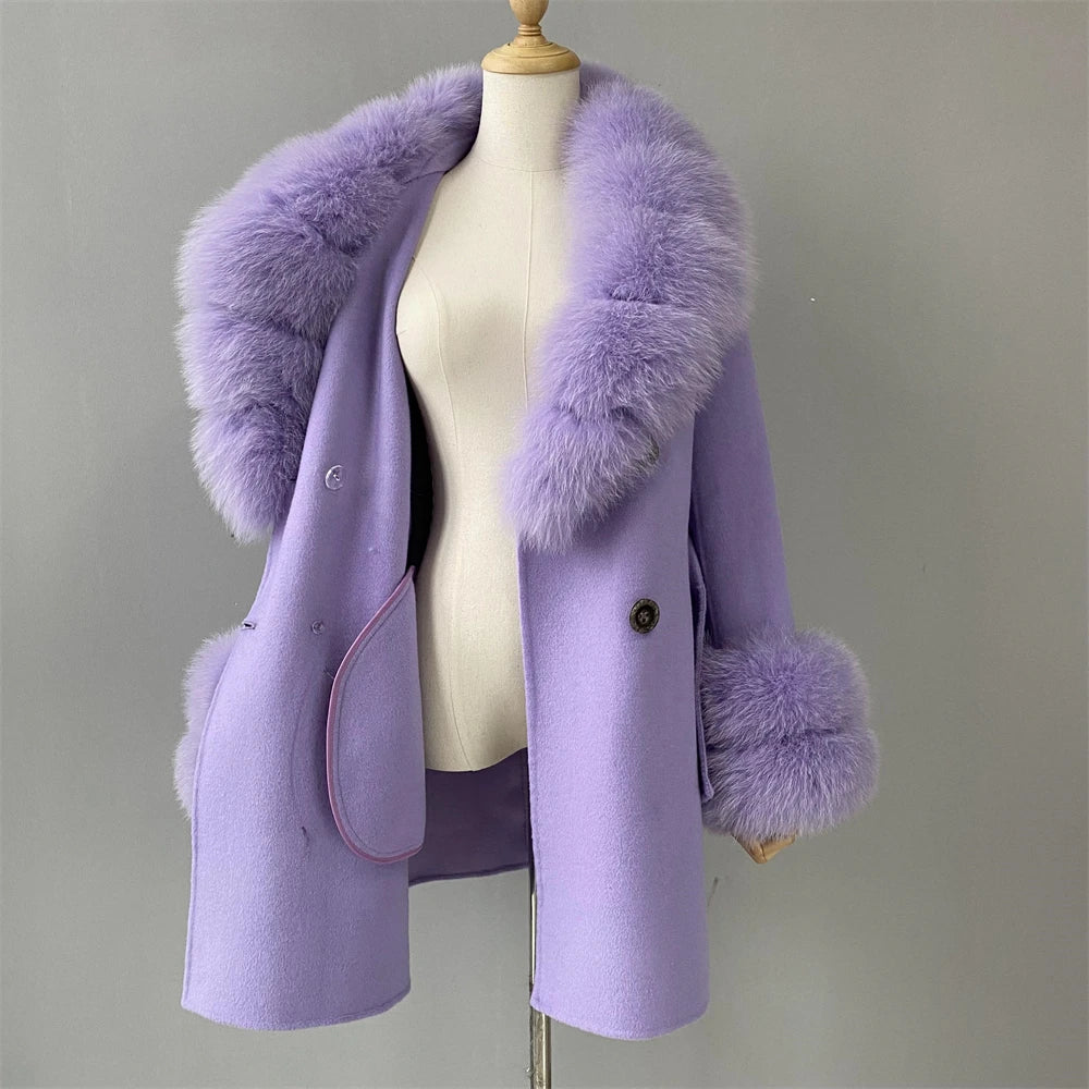 Purple coat with fur trim on a mannequin against a gray background