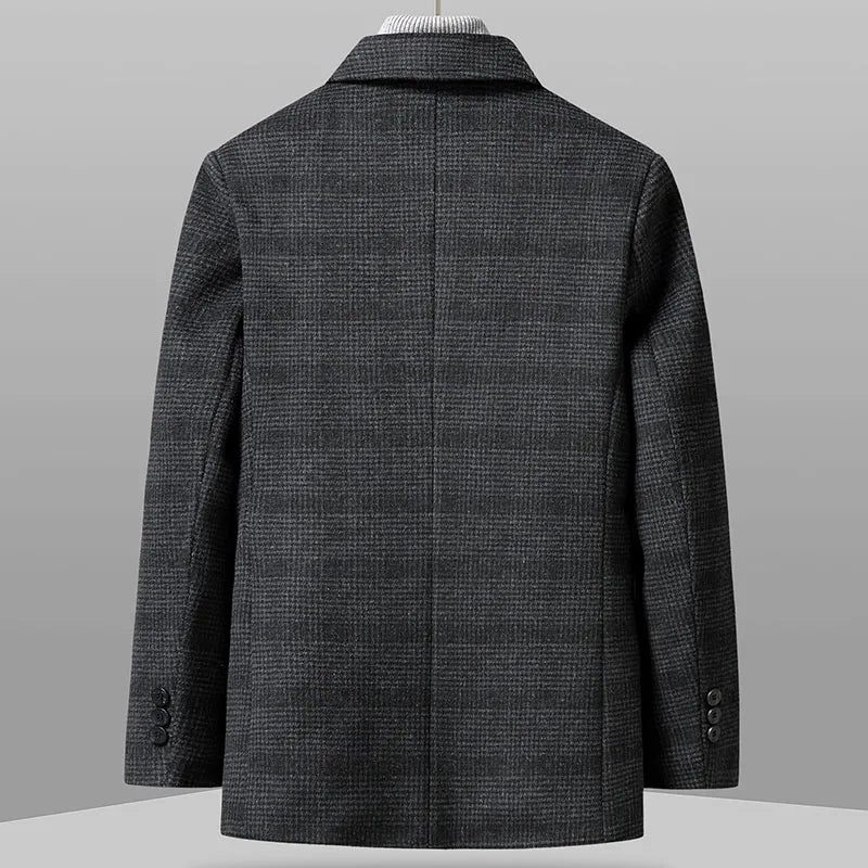 Gray checkered coat on a mannequin against a gray background