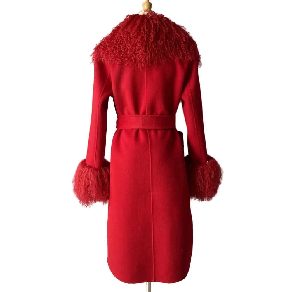 Red coat with feathered collar and cuffs on a mannequin against a plain background
