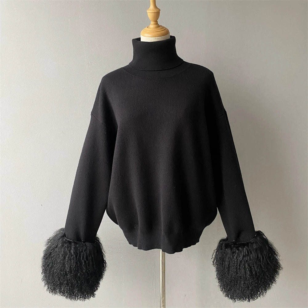 Black sweater with fluffy cuffs on a mannequin against a plain background