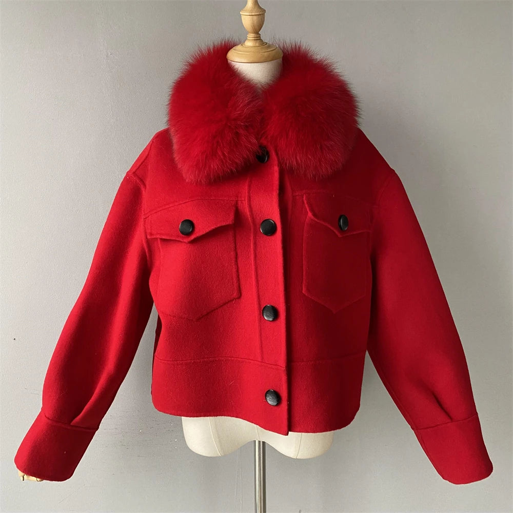 Red jacket with fur collar on a mannequin against a plain background