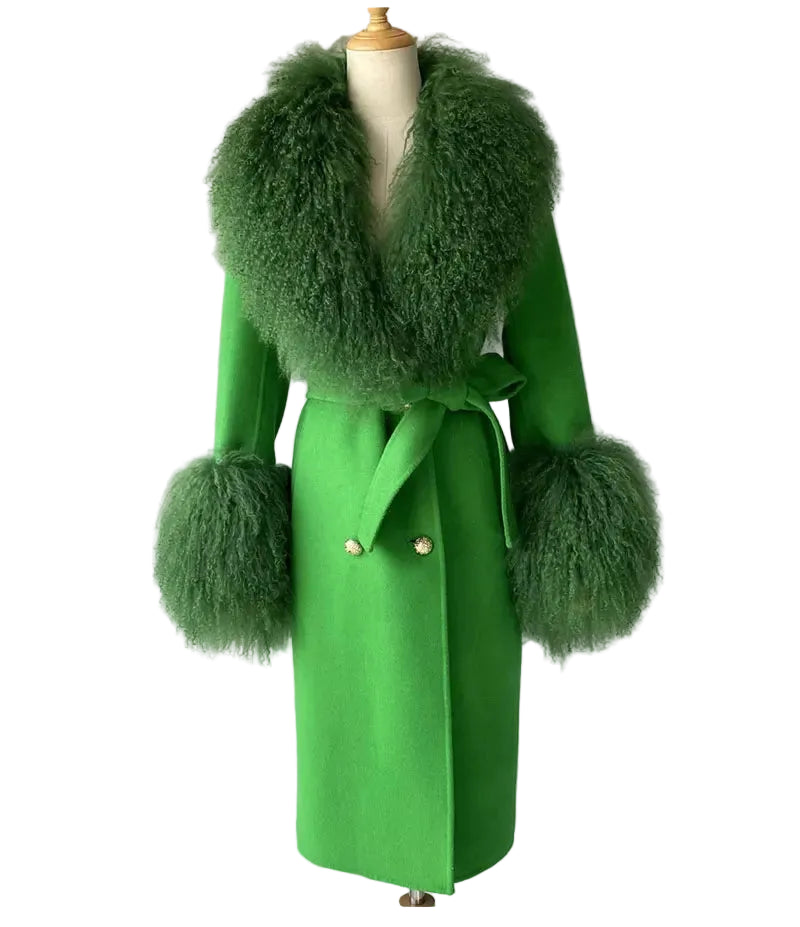 Green coat with fur accents on a mannequin against a plain background