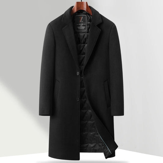 Black coat on a hanger with a visible brand label against a white background