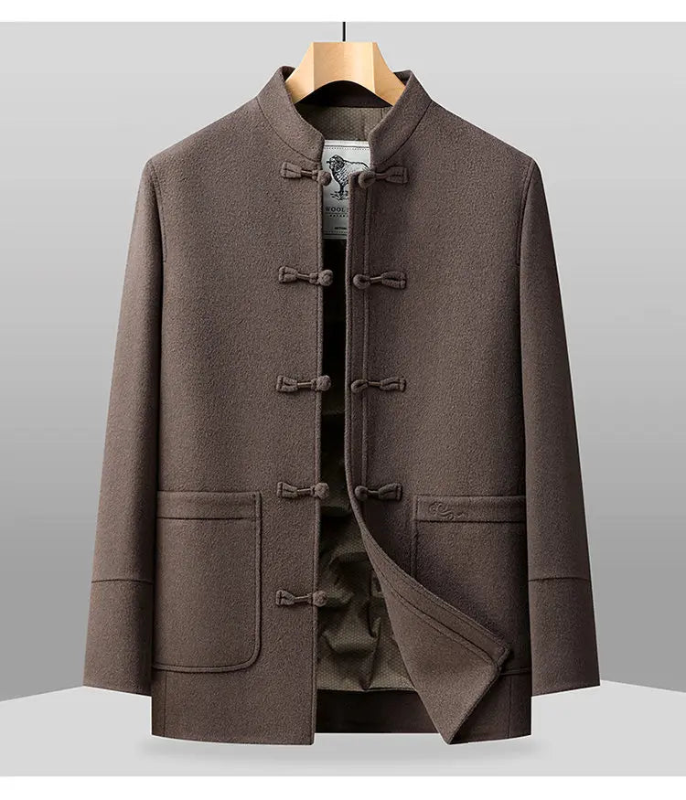 Brown coat with button details on a gray background