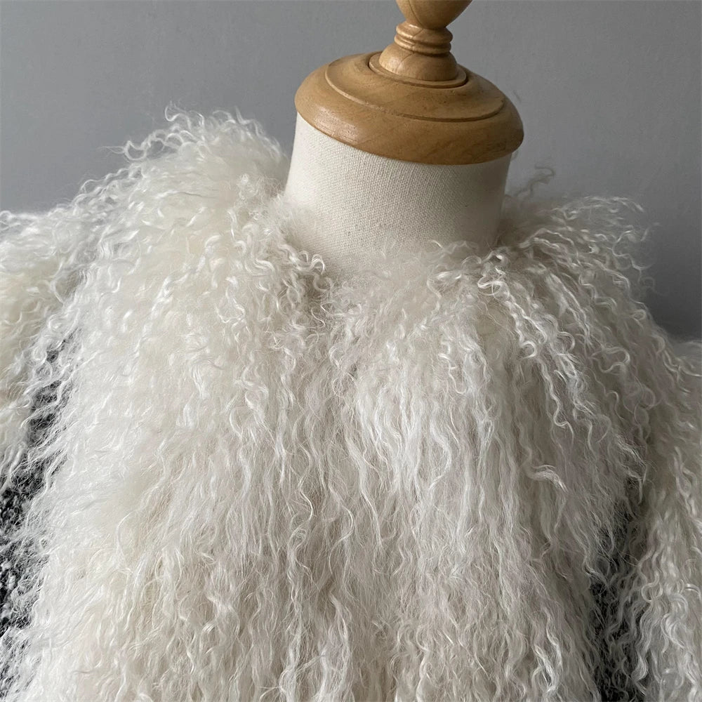 Mannequin wearing a white, fluffy garment against a gray background