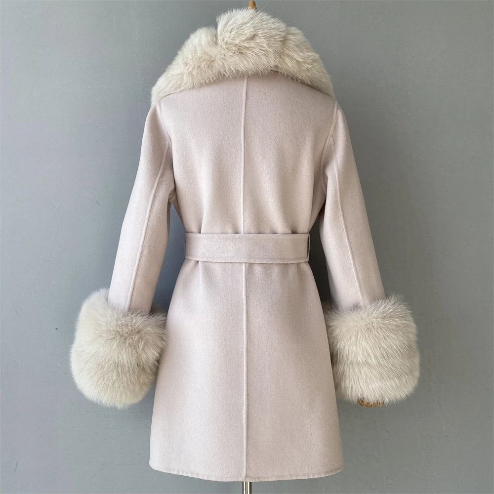 Beige coat with fur accents on a gray background