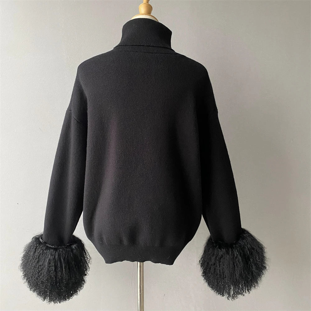 Black sweater with fluffy cuffs on a mannequin against a plain background