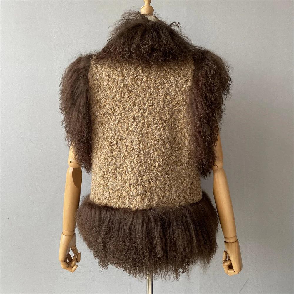 Mannequin wearing a textured beige sleeveless top with brown fringes on a plain background