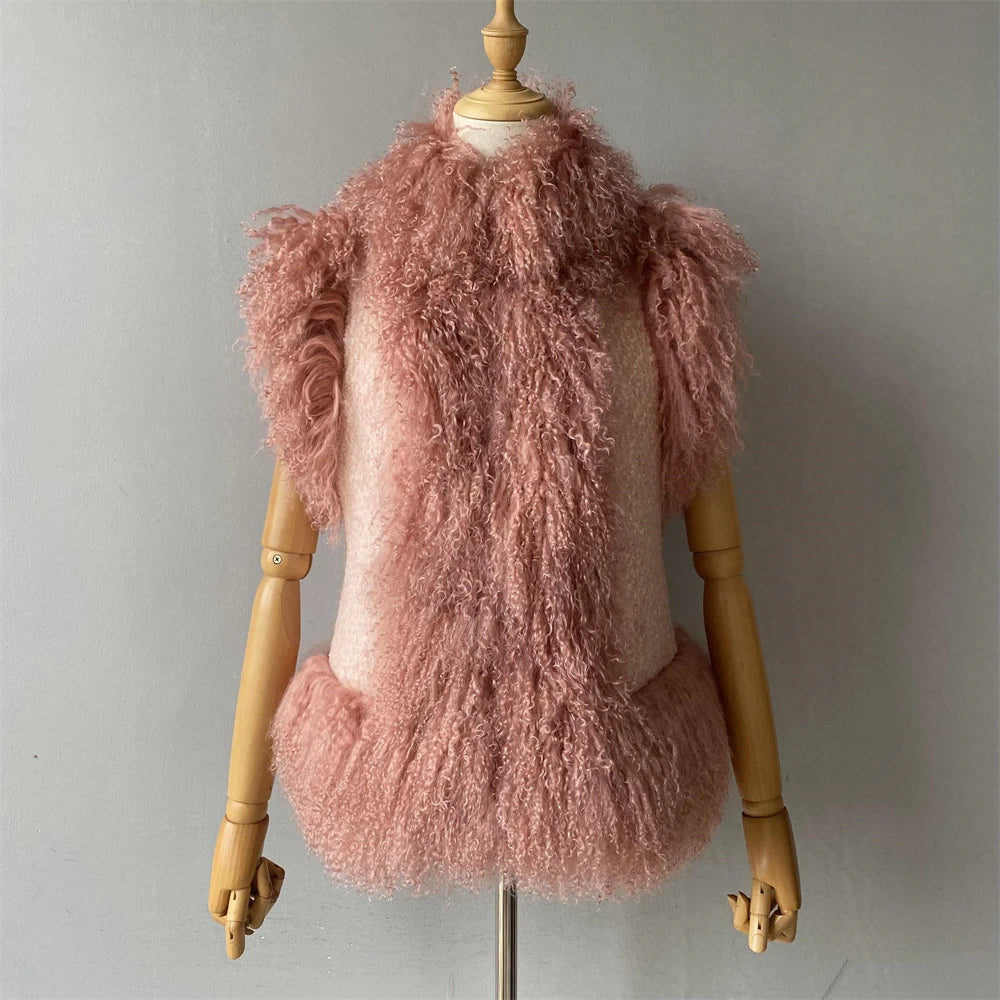 Pink fluffy vest on a mannequin against a plain background