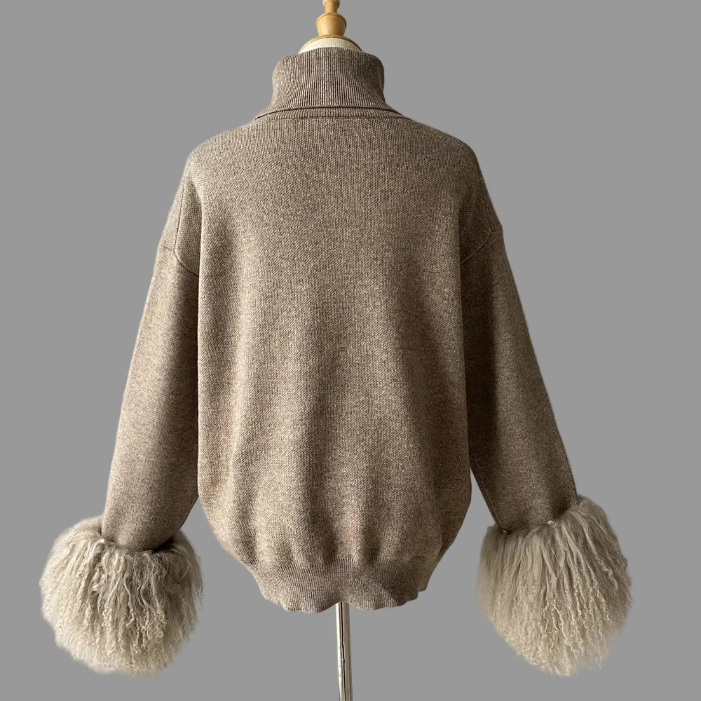 Brown sweater with fluffy cuffs on a mannequin against a gray background
